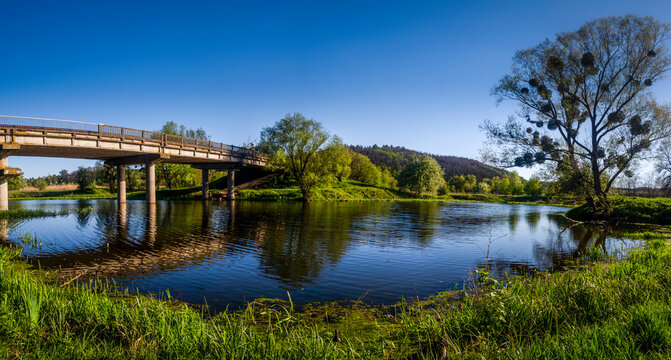 Panoranic phote of the bridge over the river