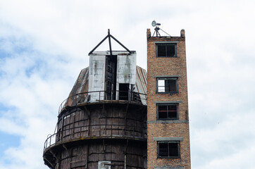 View of factory building against sky