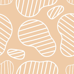 Seamless pattern with large striped spots in brown, beige tones. Terrazzo mosaic and texture. For decor, textiles, fabrics, packaging, wrapping paper, wallpaper, designs, banners, templates.