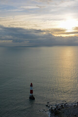 Fototapeta na wymiar Lighthouse near Beachy Head during sunset