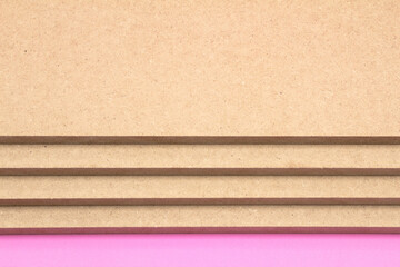 The boards of the raw MDF are arranged in stages.