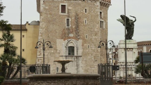 View of the fountain at the entrance of the municipal villa of Benevento with the passage of cars and people