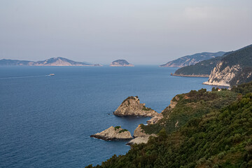 Fototapeta premium Featured in the hit film musical 'Mama Mia', the chapel of St John the Baptist sits dramatically on the top of a finger of rock off the island of Skopelos in the Aegean sea in Greece.