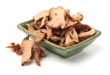Dried galangal root isolated on white background