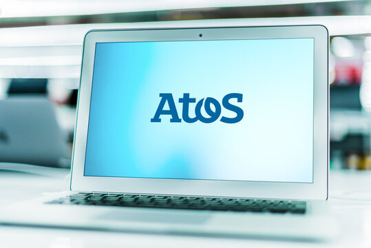 Laptop computer displaying logo of Atos