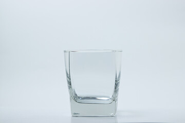 Empty glass on a white background. Isolated empty glass