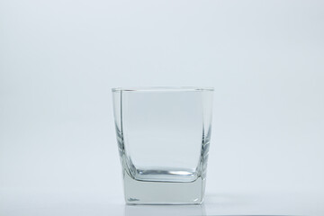 Empty glass on a white background. Isolated empty glass