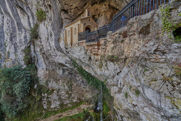 Santa Cueva de Covadonga, (Cuadonga), a Catholic sanctuary located in Asturias (Asturies). It is a grotto in the foothills of Mount Auseva, which gives its name to the parish of Covadonga in the counc
