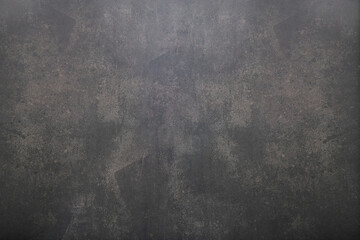 Background of old aged rough dark painted concrete with stains texture .Vintage dark concrete...