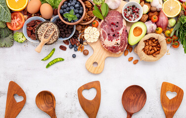 Ketogenic low carbs diet concept. Ingredients for healthy foods selection set up on white concrete background.