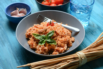 risotto with mackerel sauce - Italian recipe - closeup