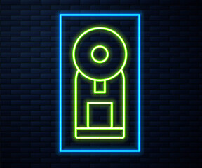 Glowing neon line Smart coffee machine system icon isolated on brick wall background. Internet of things concept with wireless connection. Vector