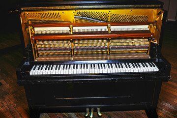 Fototapeta na wymiar Beautiful piano in concert hall