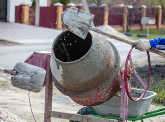 Concrete mixer for mixing sand with cement