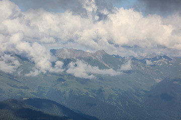 Caucasus mountains in the clouds.