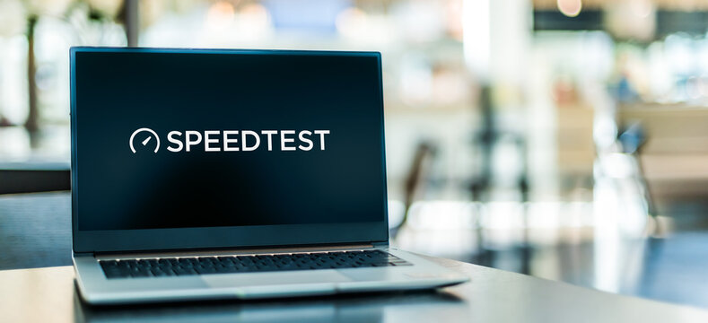 Laptop computer displaying logo of Speedtest