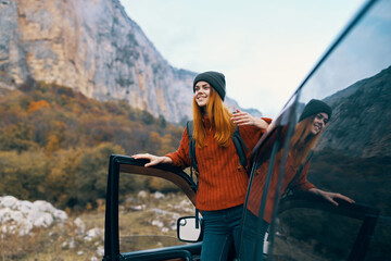 cheerful woman hiker nature mountains travel car