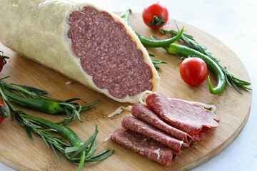 Parmesan Sausage on a white background. Local name permesanlı italyan sucuk