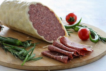 Parmesan Sausage on a white background. Local name permesanlı italyan sucuk