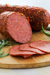 Pepperoni Sausage on Wooden Background