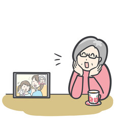 カメラ通話するシニア女性