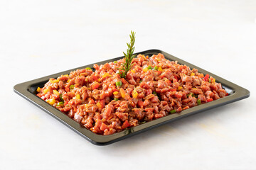 raw sauced diced meat on white wood background. Meat background. Local name dana tantuni