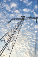 Electric poles on sky background. World Environment Day.