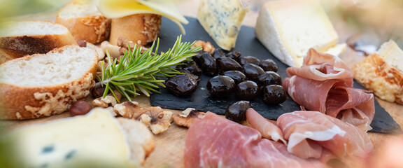 Plate with tasty mediterranean starters. Food photography with short deep of field. Close up.