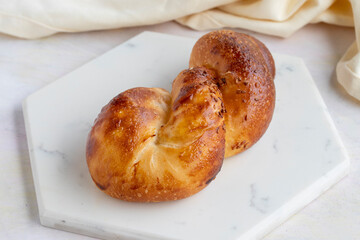 Potato pastry on a white wooden background. Local name patatesli açma