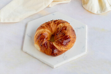 Pastry on white wooden background. Local name sade açma