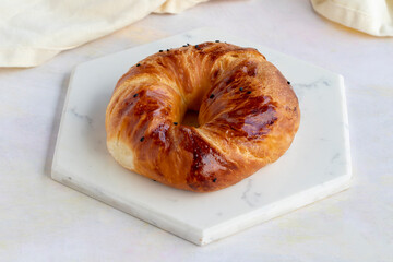 Pastry on white wooden background. Local name sade açma