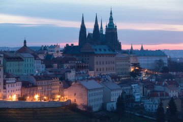 Fototapeta premium The old town of Prague, Czech Republic, during dusk without people surrounded by the historical, gothic style buildings. Stroll around Prague's old town. Romantic night.