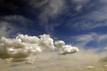 Blue sky white fluffy clouds background . Beautiful blue sky and white cumulus clouds abstract background. Cloudscape background.
