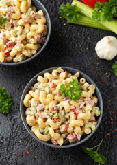Macaroni Salad with red bell pepper, onion, celery, gherkins and mayonnaise dressing
