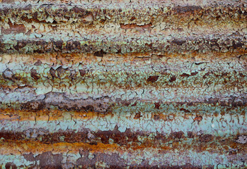 weathered rusty corrugated metal plank with chipped painting- creepy steampunk background with horizontal lines