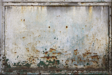 white framed metal surface of a plank, dirty, rusty and with chipped painting - blank worn background