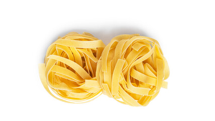 Fettuccine pasta isolated on a white background. Pasta nests.