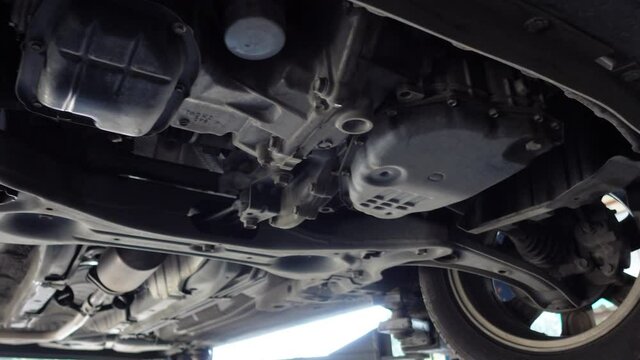 Under the car frame below part for auto repair