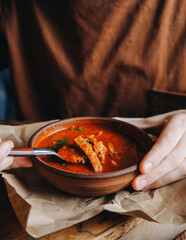 Kharcho - traditional georgian soup with tomatoes, rice, vegetables