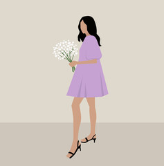 Pretty girl in a lilac dress holding a bouquet of flowers