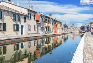 Obraz premium Comacchio, Italy - often compared to Venice for the canals and the architecture, Comacchio displays one of the most characteristic old towns in Emilia Romagna