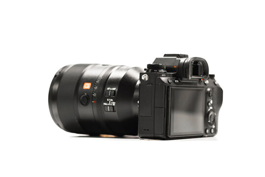 Mirrorless Sony alpha A9 with sony 135 GM Master. On white background.