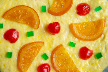 Coca de sant joan. Traditional San Juan cake to celebrate the arrival of summer in Spain made with brioche bread, candied fruit and nuts.