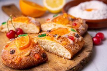 Coca de sant joan. Traditional San Juan cake to celebrate the arrival of summer in Spain made with brioche bread, candied fruit and nuts.