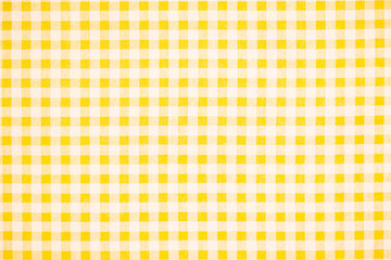 Gingham pattern in yellow and white, closed up texture of yellow and white for background. Picnic table cloth.