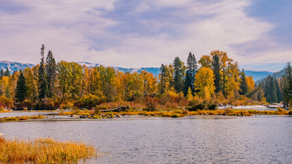 Transparent river in the mountains, amazing autumn. 