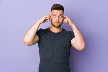 Russian handsome man over isolated background having doubts and thinking