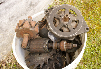 A Bucket Full of Car Parts to be Recycled