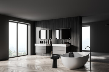 Grey bathroom interior with bathtub, two sinks and panoramic windows