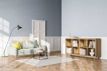 Living room interior with sofa, bookshelf wooden floor. Concept of cozy meeting reading place. 3d rendering © ImageFlow